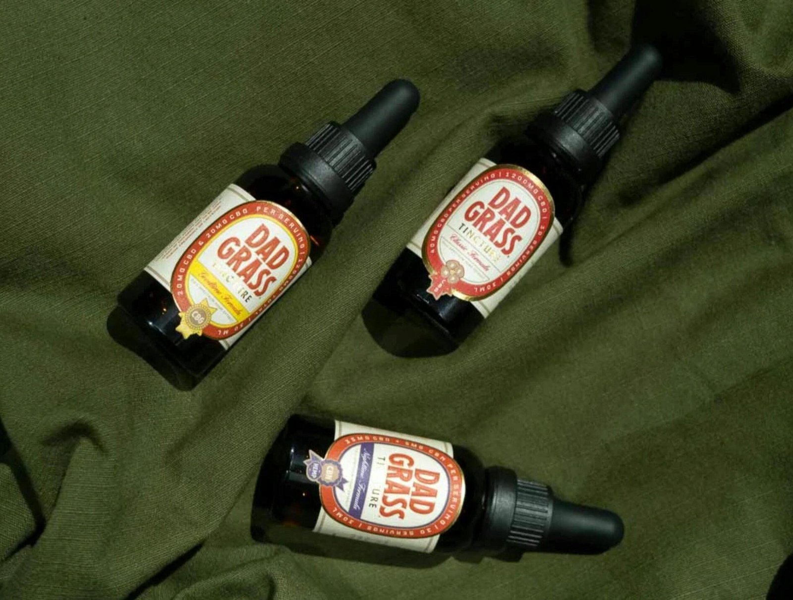 Photo of bottles showcasing different types of cold-pressed organic oils like coconut, argan, and jojoba