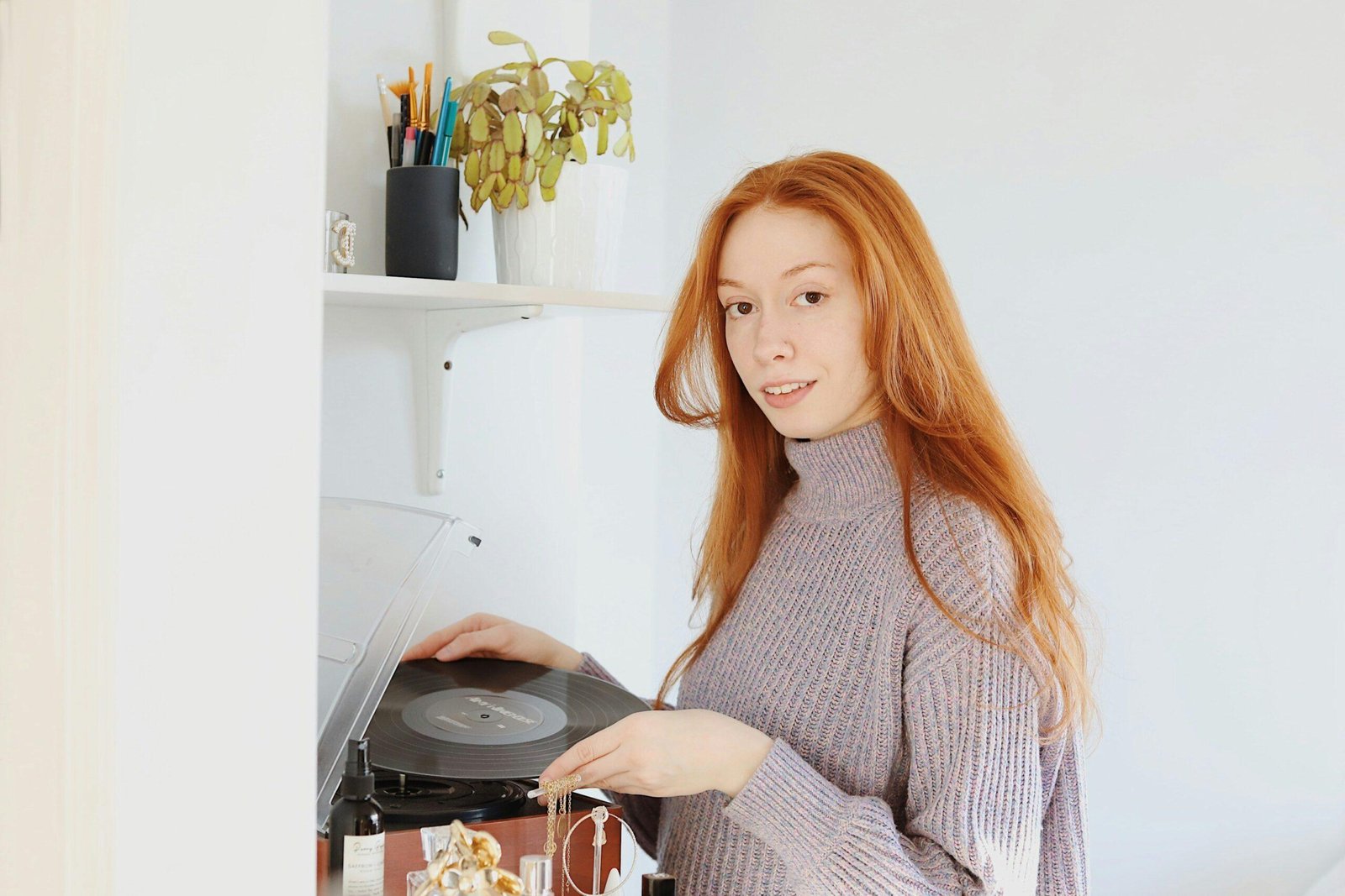 Frustrated woman looking at skincare products on her bathroom counter