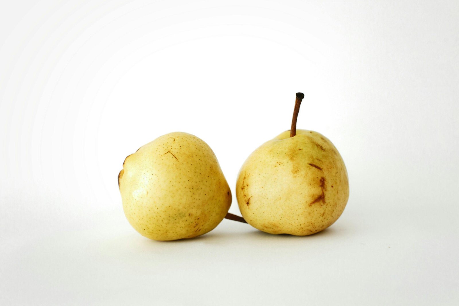 Two photos showing clear improvement in skin texture after using organic oils