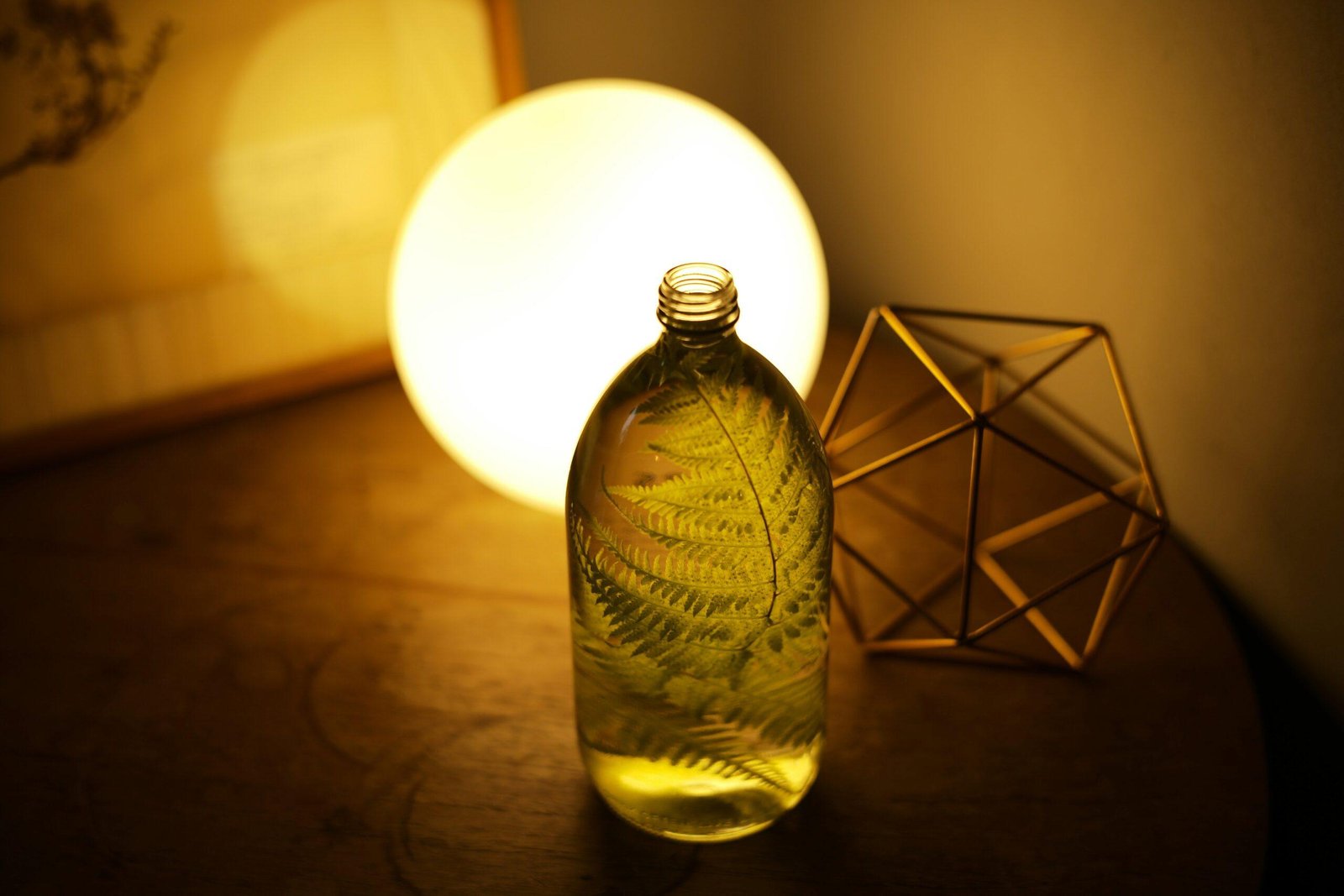 Close-up shot of a label showing 'cold-pressed' on the packaging